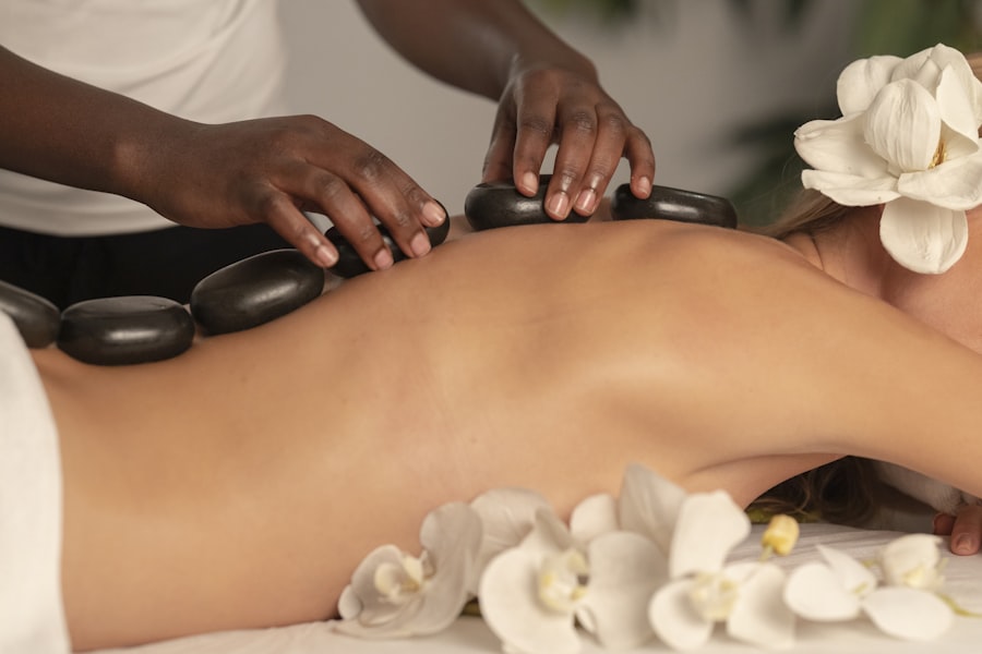 Hands resting softly on a massage table